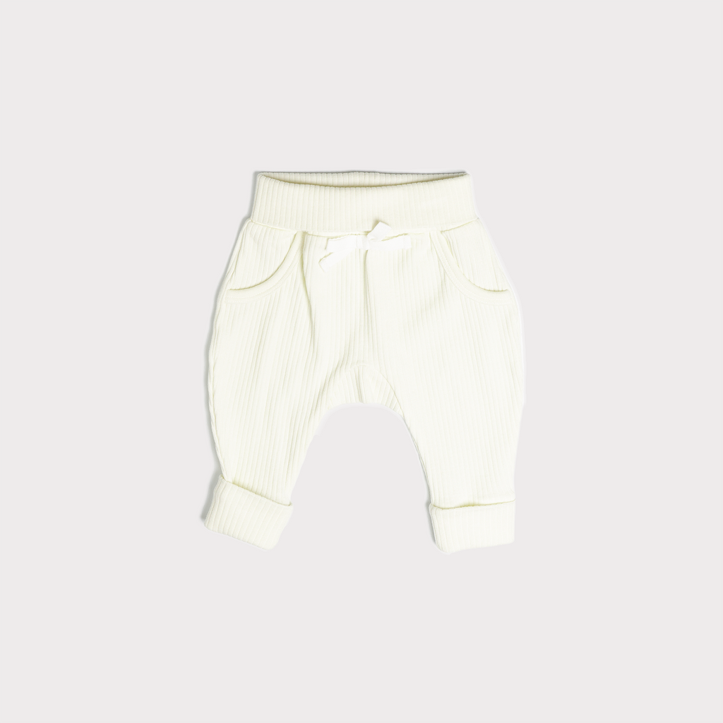 A pair of Lounge Pants in off white (vanilla), made from a soft ribbed cotton. Shown in its large setting.