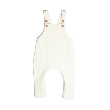 A set of overalls in off white (vanilla), made from a soft ribbed cotton. Shown in its large setting.
