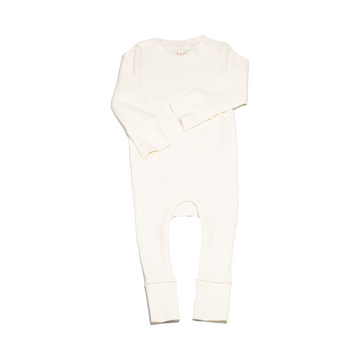 Pyjamas in an off white (vanilla), with vanilla colour contrasting wrist and ankle cuffs. Made from ribbed cotton. Shown in its large setting.