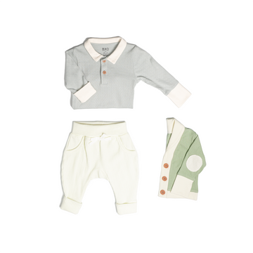 The toddler essentials bundle, consisting of a collared bodysuit in a gentle blue (butterfly pea) pointelle patterned cotton, paired with lounge pants in vanilla and ribbed cotton and a cardigan in matcha ribbed cotton.