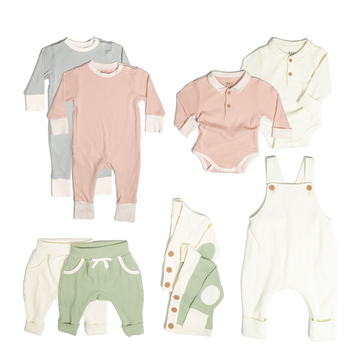 The ultimate earth-side bundle, consisting of a 2 sets of pointelle pyjamas, one in butterfly pea and one in peach, 2 pairs of ribbed cotton lounge pants, one in matcha and one in vanilla, 2 sets of ribbed cotton cardigans, one in matcha and one in vanilla, 2 sets of button bodysuits one in ribbed cotton vanilla and one in pointelle cotton peach and one pair of overalls in vanilla ribbed cotton.